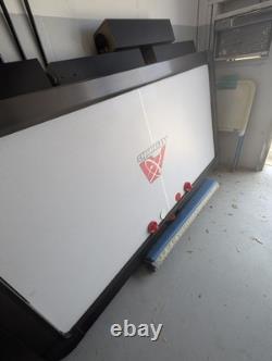 Atomic air hockey table